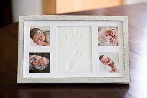 Infant handprint kit close up showing non toxic clay texture with newborn hand impression.