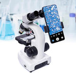Velamnia biological compound microscope with attached smartphone adapter viewing a specimen slide.