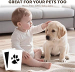 Step by step demonstration of stamping a pet dog paw print using the mess free inkless pad.