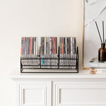 MyGift modern video game DVD media organizer rack arranged with gaming cases on an office desk.