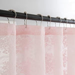 Close up view of the intricate knitted leaf and floral lace pattern on the TUDECO bathroom curtain
