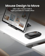 ProtoArc rechargeable wireless mouse and collapsible tablet stand arranged neatly on a travel desktop workspace setup.