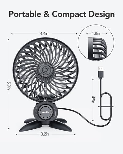 AaoLin compact USB powered fan placed on a bedside table in a bedroom setting.