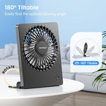 TriPole quiet cooling table fan operating next to a bed to demonstrate low noise bedroom usage.