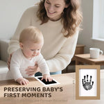 Detailed view of the package contents including four ink pads eight imprint cards and two nursery frames.