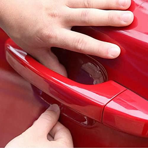 Clear TPH vinyl paint protection film applied inside a car door handle cup