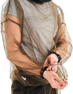 Person wearing Coghlan's Bug Jacket during outdoor camping