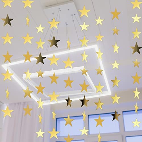 Spakon reusable shimmer paper star decorations hanging vertically on a living room wall