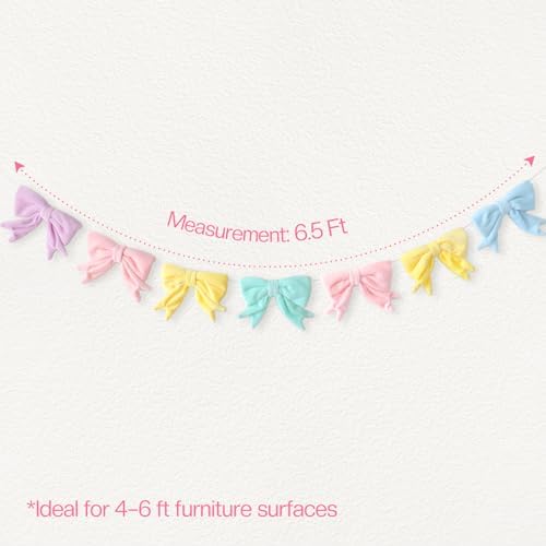 Close up view of the ultra soft pink and pastel plush fabric bows on the spring decoration banner.