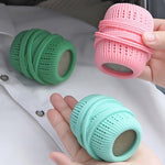 Close up view of the ribbed exterior and sponge core of the cleaning ball