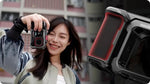 Angled view showing a compatible camera sliding securely into the type-C connected metal frame