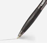 BIC Glide black ballpoint pen writing smooth lines on a notebook page