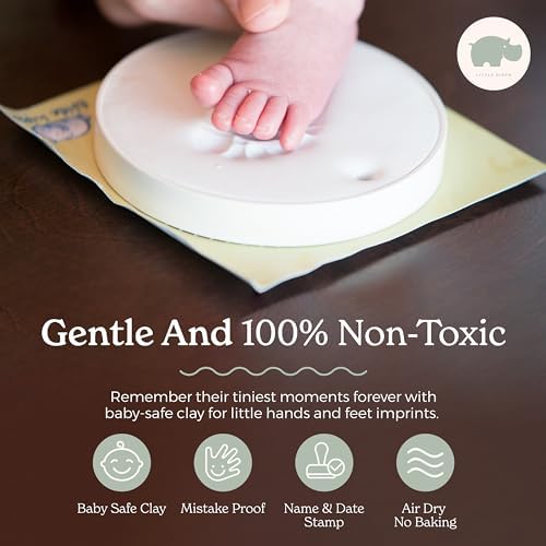 Complete contents of baby footprint casting bundle with ribbons and easels