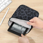 Dadanism sleeve holding a 7 inch e-reader device