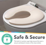 Toddler travel potty seat folded compactly next to its gray storage bag