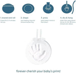 Reece Studio newborn clay impression kit packaging displaying all included tools for holiday crafting.