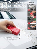 Red synthetic detailing clay bar being kneaded to show its soft and flexible texture for car paint cleaning