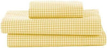 Close up view of the premium yellow gingham fabric texture from the BKB bedding collection