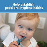 Dr. Brown's blue elephant toothbrush held by child hands