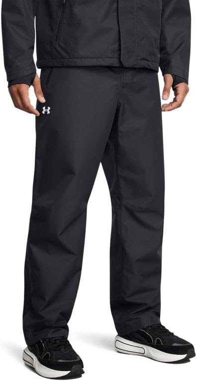 Under Armour Men's UA Stormproof Lined Rain Pants front view showcasing the waterproof fabric and signature white logo on the hip.