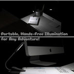 Maptay book light attached to a novel for night reading