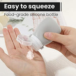 Compact tsa approved squeezable toiletry bottles next to clear travel pouch