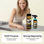 Simple Green lemon scented heavy duty degreaser spray removing oil stains from a kitchen stove cooktop