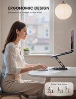 Foldable aluminum notebook holder collapsed flat for business travel portability.