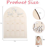 Arched wooden baby milestone board with monthly slots from one to twelve.
