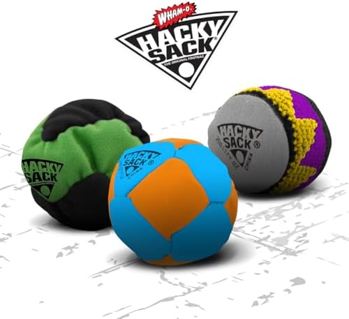 Wham-O Hacky Sack one point ninety inch premium ball held in hand for scale