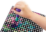 A young girl smiling while completing the DJ Bunny character poster using the satisfying stamp art technique.