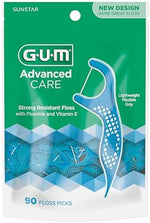 Close up of shred resistant dental floss infused with Vitamin E and Fluoride.
