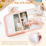 Infant cloth memory album displaying the soft stitched edges for child finger safety.