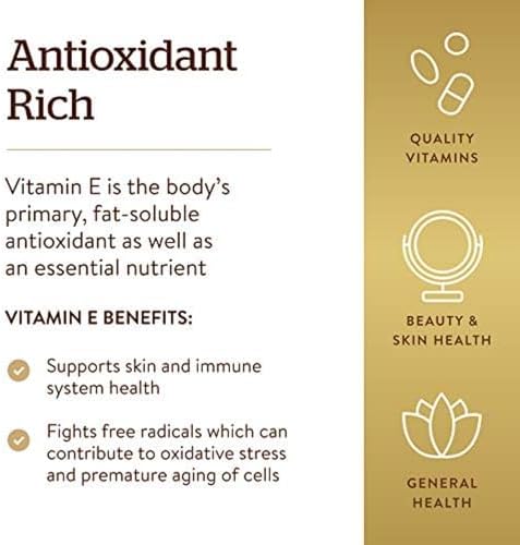 Solgar Vitamin E softgels poured out showing oil-based texture