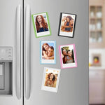 Quality Photo microfiber cleaning cloth wiping an instant photography lens alongside colorful borders.
