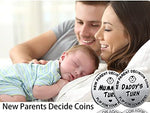 Engraved Mommy and Daddy turn decision coin close up