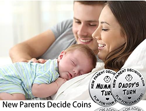 Engraved Mommy and Daddy turn decision coin close up