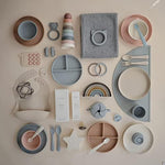 Mushie silicone suction plate in ivory packaging