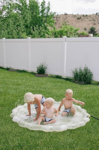 Brooklyn Neutral 67-inch water mat pool being used by toddlers in a grassy backyard setting