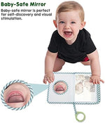 Boczif cloth baby memory book hanging from a stroller bar using the attached plastic ring