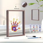 Family handprint kit assembled with layered transparent prints