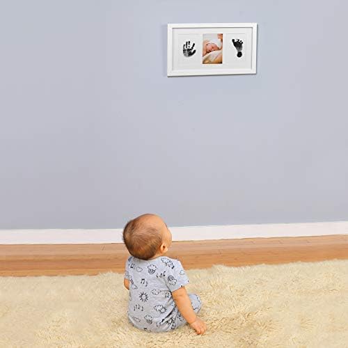 Green Pollywog newborn memory kit accessories including four pieces of acid-free white paper and ink pad.