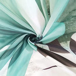 Packaging contents showing the VeiVian seventy by seventy inch teal shower curtain and rings