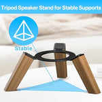 Modern home office setup featuring wooden speaker stand