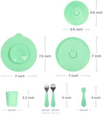 Ubbi baby led weaning set components unboxed including silicone spoon and interchangeable suction base