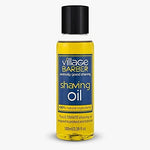 Village Barber natural pre-shave oil 3.39 fluid ounces container displaying clean botanical ingredients list