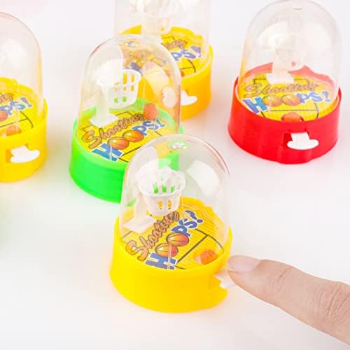 Children playing with mini basketball party favor toys