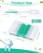 Close-up view of the dual-ended design highlighting the soft green silicone bristles on one side and the curved toothpick tip on the other.