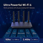 GL.iNet dual-band wireless internet router operating in a modern home office environment setup.