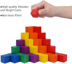 Toddler stacking the 108 pack colorful geometric blocks to build a creative tower structure